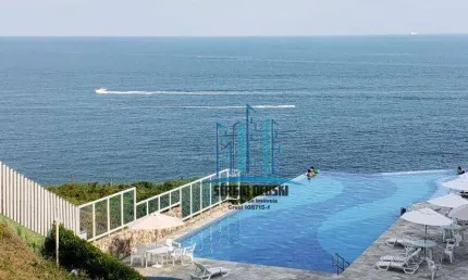 Vista mar incrível, varanda, 2 suítes. Piscina com borda infinita. Guarujá-SP.