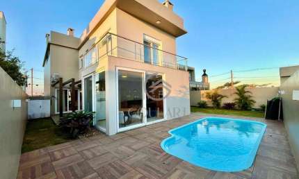 Casa diferenciada com 4 Dormitórios no Alphaville Pelotas