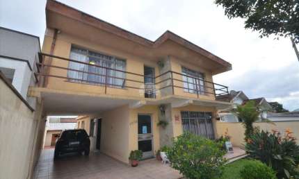 Casa com 5 quartos à venda na Rua Magdalena Taborda Ribas, 1080, Novo Mundo, Curitiba, 224 m2 por R$ 950.000