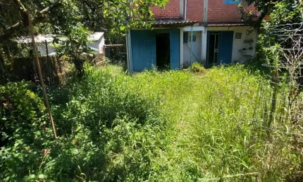 TERRENO COM 1155M2  E 02 CASAS ANTIGAS EM GRAVATAI/ RS.