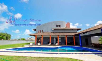 Luxuosa casa no Bairro Dunas com 5 suítes e vista para o mar.