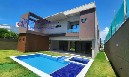 Linda casa duplex alto padrão com 5 suítes no Alphaville Fortaleza.