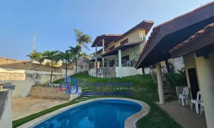 Casa ampla com 4 suítes e vista mar no Porto das Dunas.