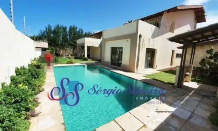 Linda casa duplex no Porto das Dunas com 6 suítes e próximo a praia