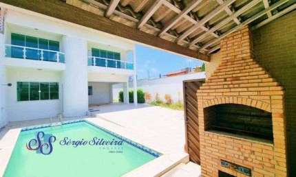 Casa com piscina, deck com churrasqueira próxima a W. Soares 4 suítes José de Alencar