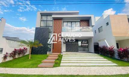 CASA COM 4 SUÍTES SENDO 3 COM CLOSET E VARANDA PISCINA E GOURMET COMPLETA