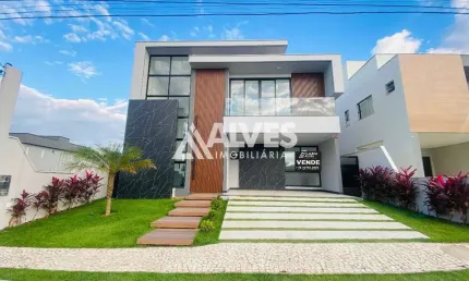 CASA COM 4 SUÍTES SENDO 3 COM CLOSET E VARANDA PISCINA E GOURMET COMPLETA