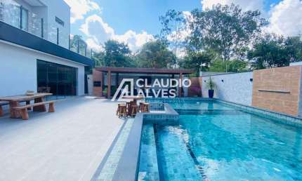 CASA DE ALTO PADRÃO MODILIADA COM 4 SUÍTES PISCINA E ÁREA GOURMET COMPLETA