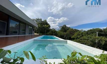 Casa de Condomínio com 5 quartos e 7 banheiros à venda, 615 m² por R$ 5.500.000