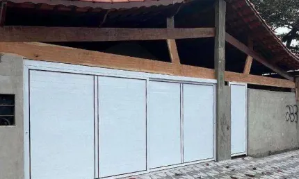 Casa com 4 dormitórios à venda, 100 m² por R$ 870.000,00 - Tupi - Praia Grande/SP