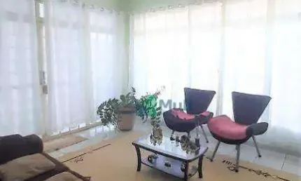 Casa no Bairro Lagoinha com 230 m² de área útil, varanda gourmet e piscina.