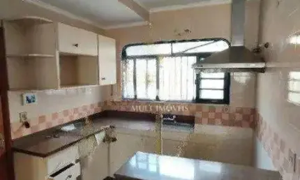 Excelente Sobrado Residencial/Comercial no Bairro Jardim América com 405m² de terreno e 315m² de área construída.