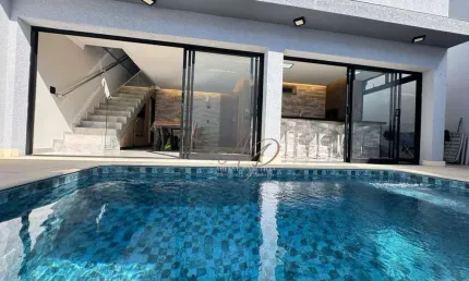 Casa com 3 suítes, piscina, ACEITA PERMUTA à venda, 240 m² por R$ 1.580.000 - Condomínio Villagio Milano