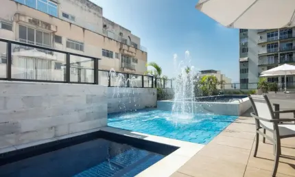 Apartamento de dois quartos sendo 1 suíte em condomínio clube