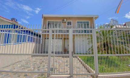Casa com 5 dormitórios para alugar, 300 m² por R$ 6.165,40/mês - Balneário - Florianópolis/SC