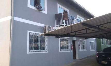 Prédio residencial inteiro à venda no bairro Nova Esperança em Guaramirim com 8 unidades de apartamentos