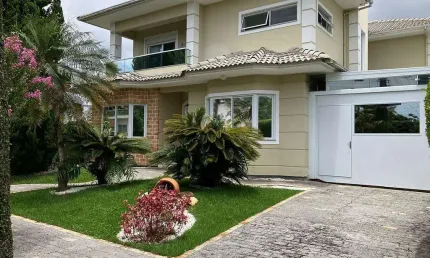 Casa com 4 suítes à venda em Jurerê Internacional, Florianópolis — conforto e elegância