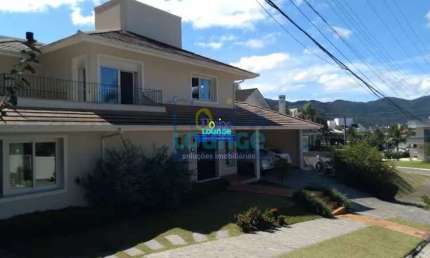 Casa em condomínio fechado com 4 quartos, 3 suítes, à venda em Cacupé - CAC4CC2646