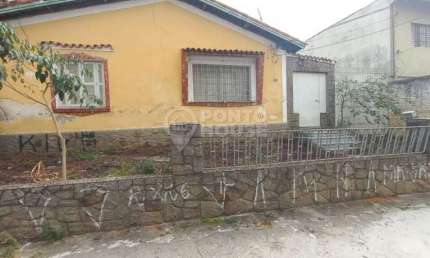 Terreno à venda no bairro Vila Brasilina com uma casa térrea e 3 vagas