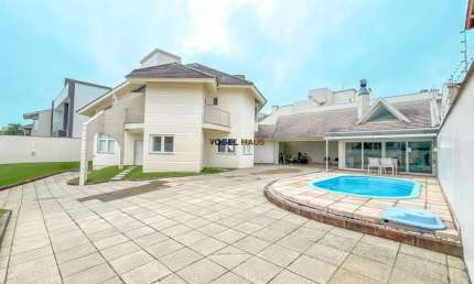 Casa-sobrado, mobiliado, 4 dormitórios, 1 escritório, com piscina. Bairro Marechal Rondon-Canoas