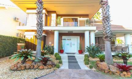 Casa em Condomínio de Alto Padrão | 3 suítes | 429 m² privativos | Cidade Nova - Canoas.