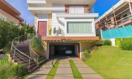 Casa em Condomínio Quintas do Lago | 4 suítes | 400 m² | Marechal Rondon - Canoas.