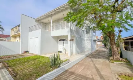 Casa com 4 dormitórios à venda, bairro Niterói - Canoas.