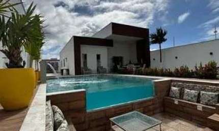 Casa com 3 dormitórios à venda, 300 m² por R$ 980.000,00 - Arembepe - Camaçari/BA
