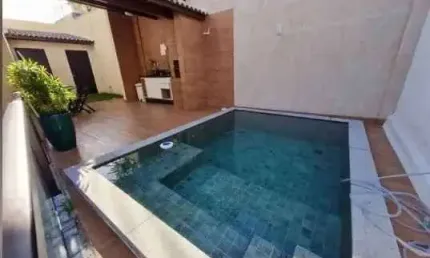 Casa com 3 dormitórios à venda, 180 m² por R$ 739.000,00 - Buraquinho - Lauro de Freitas/BA