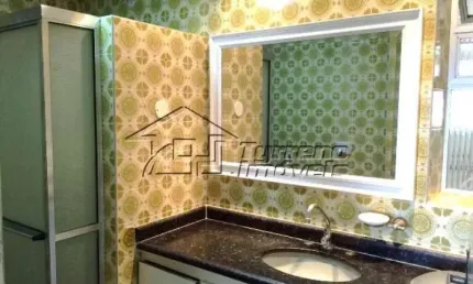 Apartamento 2 dormitórios, dependência de empregada, 1 vaga no centro