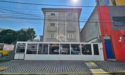 OPORTUNIDADE!!! KITÃO C/ 01 VAGA DE GARAGEM NO CENTRO DO BOQUEIRÃO,  PRAIA GRANDE SP.