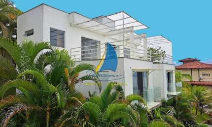 Imperdível! Casa de luxo à venda em Ilhabela-SP, bairro Siriuba: 3 suítes, 2 salas, 5 banheiros, vista para o mar, 409m².