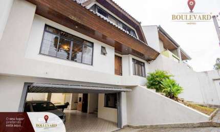 Casa com amplo quintal, piscina e 3 dormitórios à venda, 271 m² por R$ 1.650.000 - Jardim das Américas - Curitiba/PR