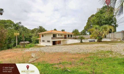 Terrenos na Rodovia da Uva com casa em alvenaria à venda, 22633 m² por R$ 5.659.000 - Embu - Colombo/PR