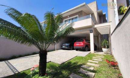 Casa com quintal, edícula e 3 dormitórios à venda, 274 m² por R$ 1.590.000 - Uberaba - Curitiba/PR