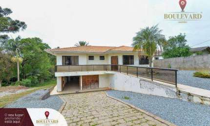 Casa com área verde e 3 dormitórios à venda, 170 m² por R$ 2.499.000 - Embu - Colombo/PR