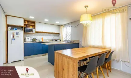 Sobrado de esquina com 3 dormitórios à venda, 98 m² por R$ 549.000 - Uberaba - Curitiba/PR