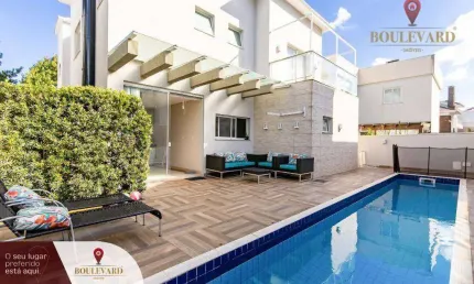 Casa no Jardim América com 4 dormitórios à venda, 343 m² por R$ 3.600.000 - Uberaba - Curitiba/PR