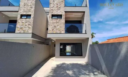 Sobrado novo com quintal e 3 dormitórios à venda, 125 m² por R$ 899.000 - Xaxim - Curitiba/PR