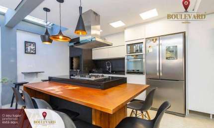 Sobrado em condomínio fechado com 3 dormitórios à venda, 120 m² por R$ 695.000 - Uberaba - Curitiba/PR