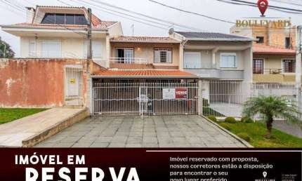 Sobrado semi-mobiliado de rua com 3 dormitórios à venda, 116 m² por R$ 490.000 - Cajuru - Curitiba/PR