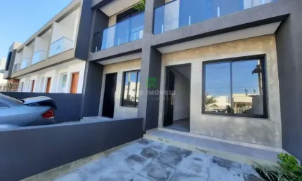 Sobrado com ótimo acabamento composto por 2 dormitórios sendo 1 suíte com sacada, living 2 ambientes, lavabo, área de serviço, pátio privativo, churr