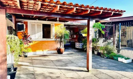 casa térrea no loteamento Moradas do Sul, um residencial de referência no bairro Hípica zona sul de Porto Alegre. O imóvel conta com 3 dormitórios, a