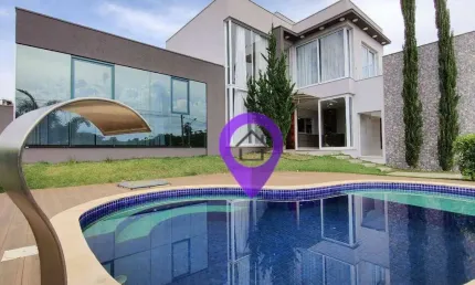 Casa contemporânea de 235m² no Condomínio Las Palmas, Pouso Alegre. 4 dormitórios, suíte máster, piscina com hidromassagem.