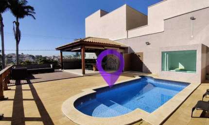 Casa exclusiva de 632m² em Pouso Alegre com 4 suítes, piscina panorâmica e área gourmet.