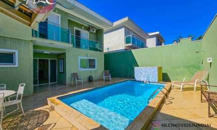 Venda - Maravilhosa Casa a Venda em Condomínio Village das Flores - 3 Suítes 4 Vagas de Garagem, Piscina