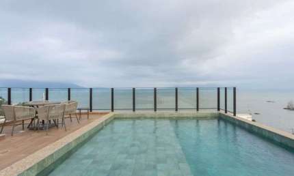Studio Novo em Coqueiros: Charme e Conforto à Beira-Mar
