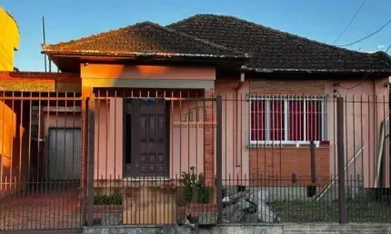 Casa com 4 quartos à venda no Marechal Rondon, Canoas 