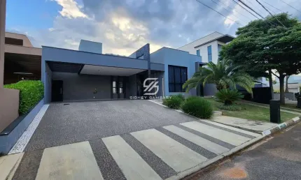 Casa térrea com 4 suítes e ampla área de lazer no condomínio Fazenda Imperial.