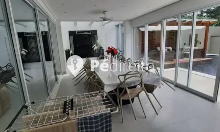 Casa em condomínio fechado com 5 quartos à venda na Passeio Tipuana, 1000, Riviera de São Lourenço, Bertioga por R$ 6.900.000